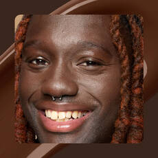 Close-up of model wearing Wonder Snatch(TM) Concealer in Shade 30 Rich Espresso.