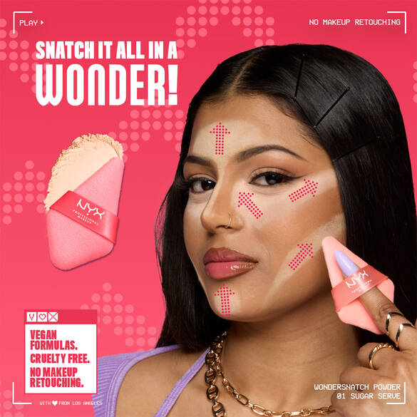 Model applying Wonder Snatch™ Setting Powder with Wonder™ Powder Puff with arrows showing direction of application