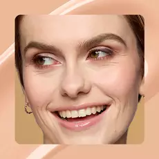Close-up of model wearing Wonder Snatch(TM) Concealer in Shade 08 Vanilla.