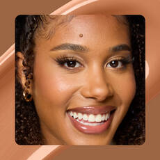 Close-up of model wearing Wonder Snatch(TM) Concealer in Shade 22 Cafe.