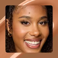 Close-up of model wearing Wonder Snatch(TM) Concealer in Shade 22 Cafe.
