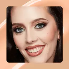Close-up of model wearing Wonder Snatch(TM) Concealer in Shade 06 Fair.