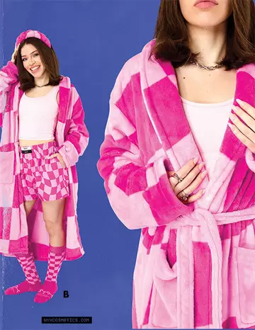 A person wearing a pink and white checkered robe, matching boxers, socks, and a white tank top, standing against a blue background.