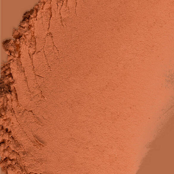 Texture swatch of Wonder Snatch™ Setting Powder in shade Cinnamon Catch, a translucent rich shade