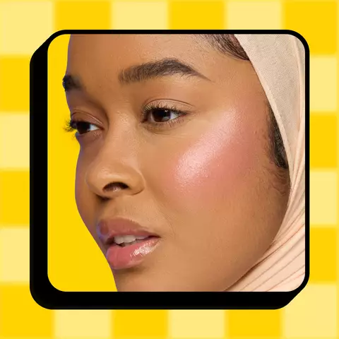 NYX Professional Makeup Saucy Sisters' Fat Cheeks Blush in shade 01 Snarky Scarlet, product displayed on a yellow checkered background.