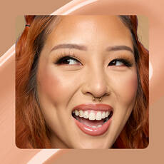 Close-up of model wearing Wonder Snatch(TM) Concealer in Shade 13 Medium Light.