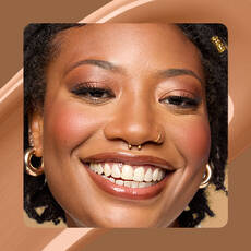 Close-up of model wearing Wonder Snatch(TM) Concealer in Shade 21 Cappuccino.