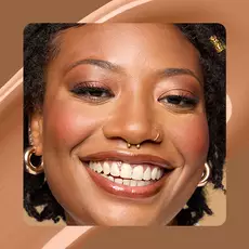 Close-up of model wearing Wonder Snatch(TM) Concealer in Shade 21 Cappuccino.