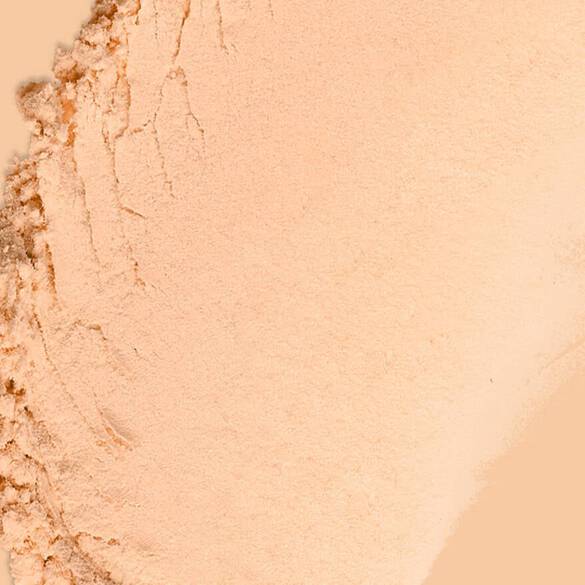 Texture swatch of Wonder Snatch™ Setting Powder in shade Peach Posse, a brightening peach shade