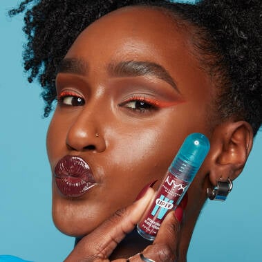 model holding bottle of lip I.V.