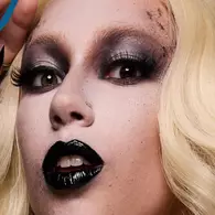 NYX Professional Makeup gothic Halloween look with pale face makeup, smoky black eyes, black lips and dark contouring.